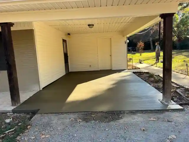 New carport slab under a covered porch